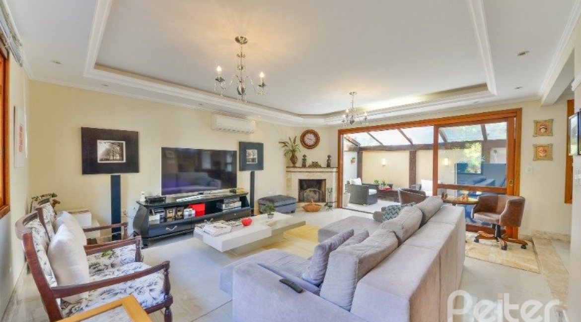 Casa em Condomínio à venda com 347m², 3 dormitórios, 1 suíte, 3 vagas, no bairro Jardim Isabel em Porto Alegre