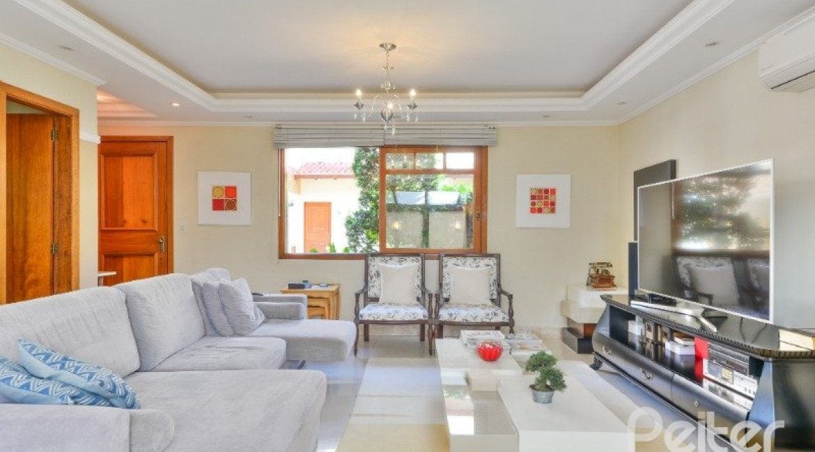 Casa em Condomínio à venda com 347m², 3 dormitórios, 1 suíte, 3 vagas, no bairro Jardim Isabel em Porto Alegre