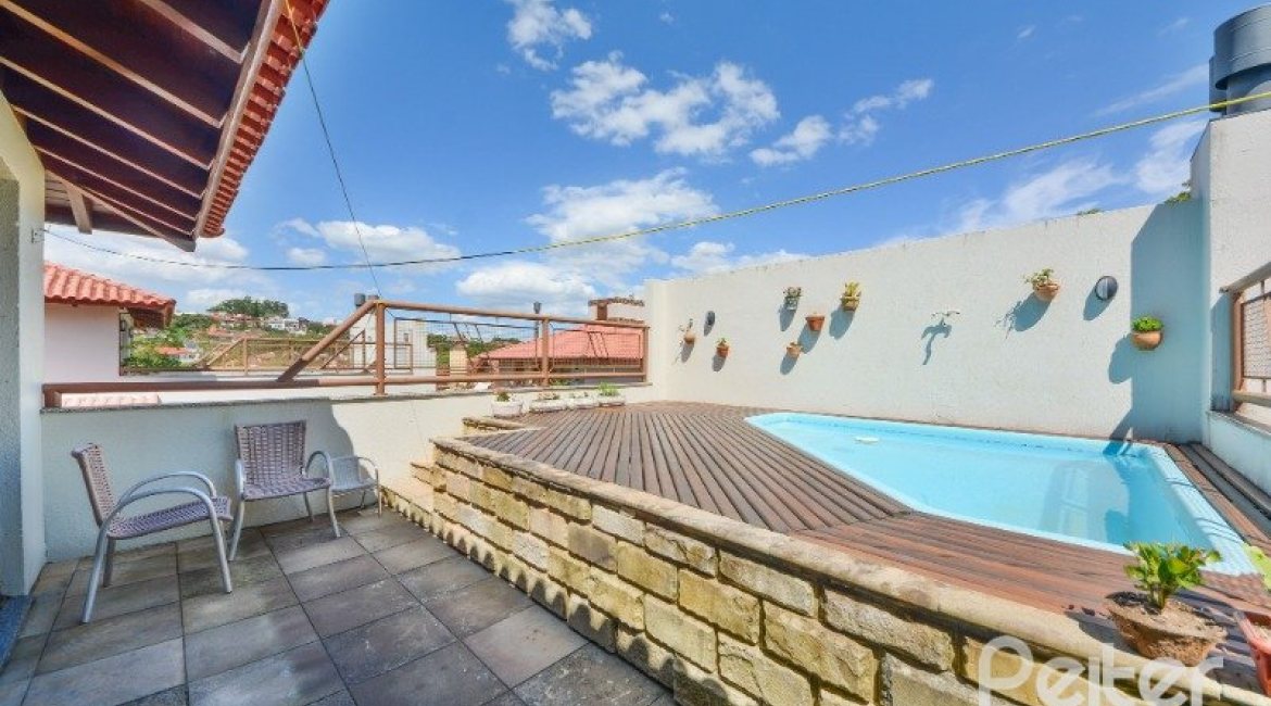 Casa em Condomínio à venda com 347m², 3 dormitórios, 1 suíte, 3 vagas, no bairro Jardim Isabel em Porto Alegre