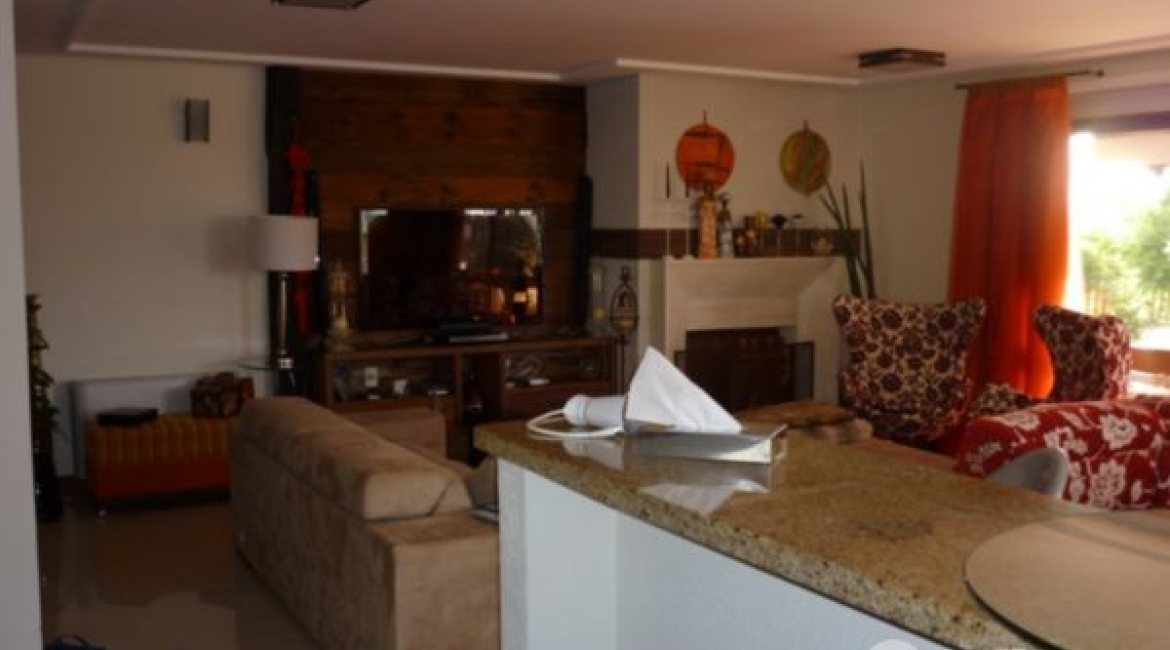 Casa em Condomínio à venda com 500m², 4 dormitórios, 4 suítes, 3 vagas, no bairro Vila Assunção em Porto Alegre