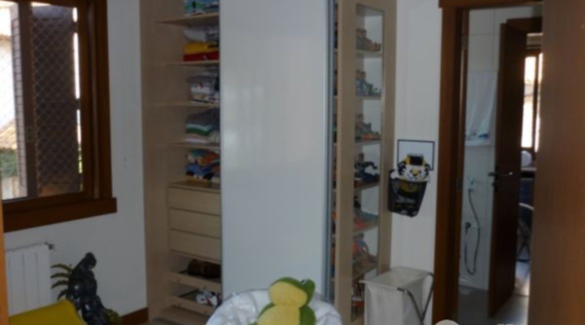 Casa em Condomínio à venda com 500m², 4 dormitórios, 4 suítes, 3 vagas, no bairro Vila Assunção em Porto Alegre