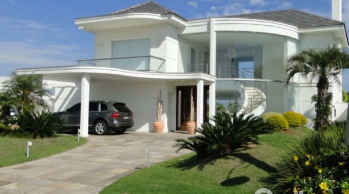 Casa em Condomínio à venda com 472m², 4 dormitórios, 3 suítes, 2 vagas, no bairro Terra Ville em PORTO ALEGRE