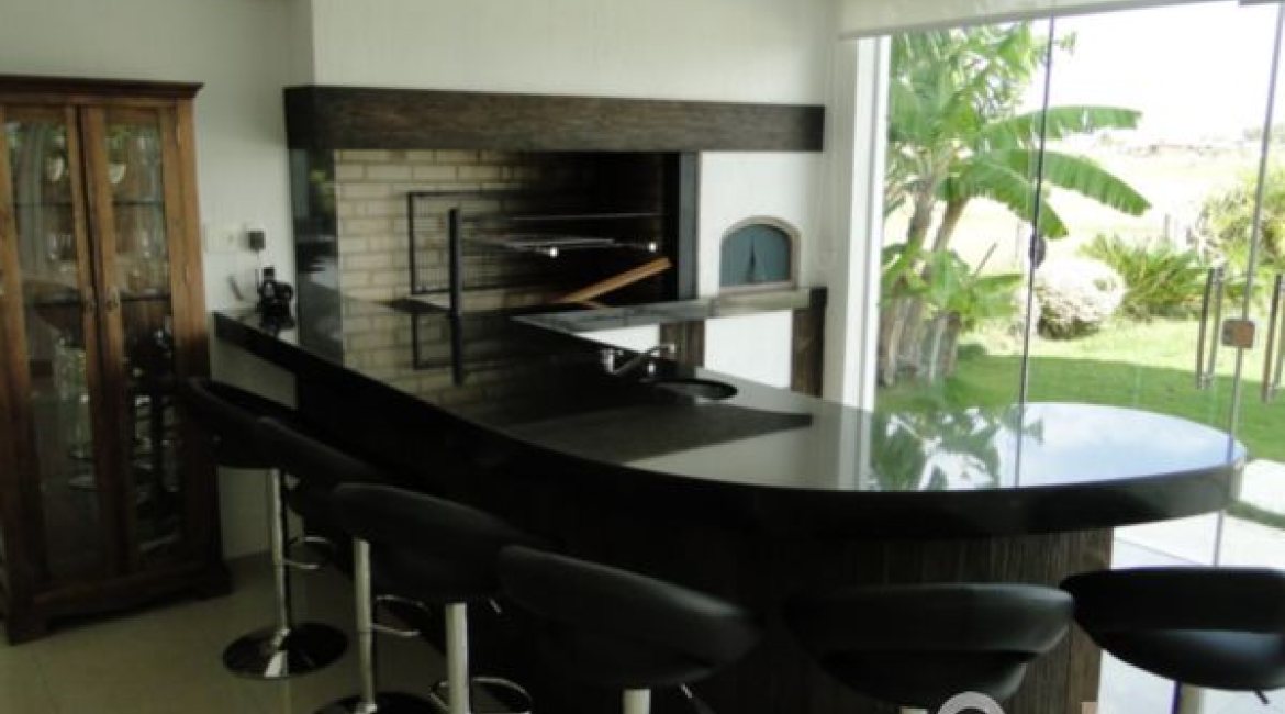 Casa em Condomínio à venda com 472m², 4 dormitórios, 3 suítes, 2 vagas, no bairro Terra Ville em PORTO ALEGRE