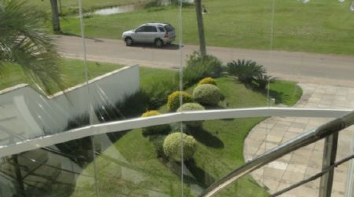 Casa em Condomínio à venda com 472m², 4 dormitórios, 3 suítes, 2 vagas, no bairro Terra Ville em PORTO ALEGRE