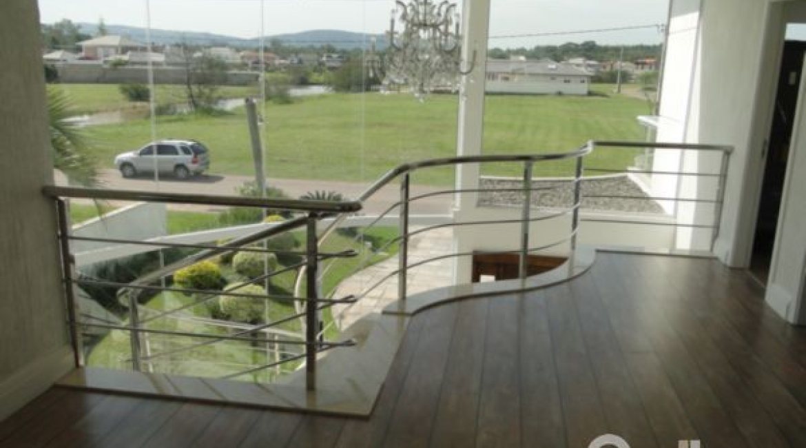 Casa em Condomínio à venda com 472m², 4 dormitórios, 3 suítes, 2 vagas, no bairro Terra Ville em PORTO ALEGRE