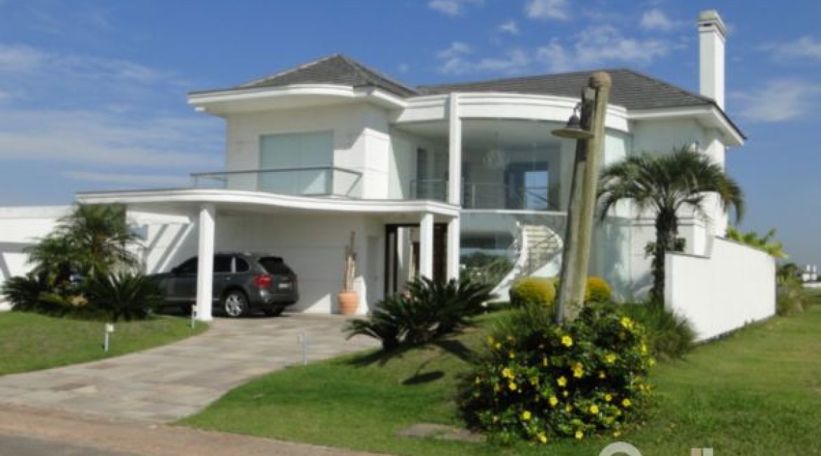 Casa em Condomínio à venda com 472m², 4 dormitórios, 3 suítes, 2 vagas, no bairro Terra Ville em PORTO ALEGRE