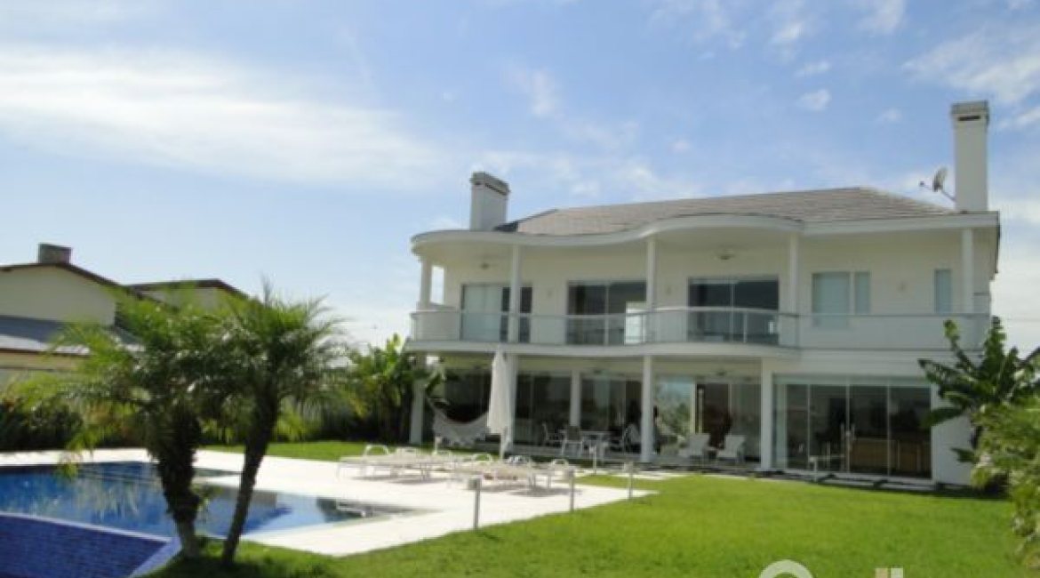 Casa em Condomínio à venda com 472m², 4 dormitórios, 3 suítes, 2 vagas, no bairro Terra Ville em PORTO ALEGRE