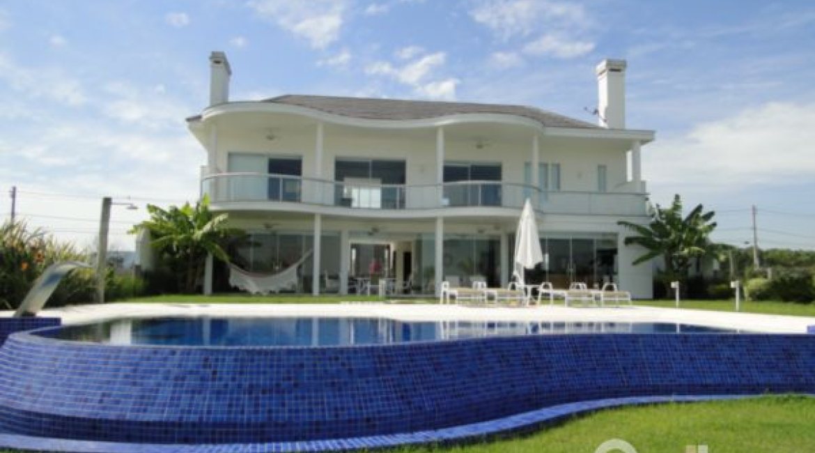 Casa em Condomínio à venda com 472m², 4 dormitórios, 3 suítes, 2 vagas, no bairro Terra Ville em PORTO ALEGRE