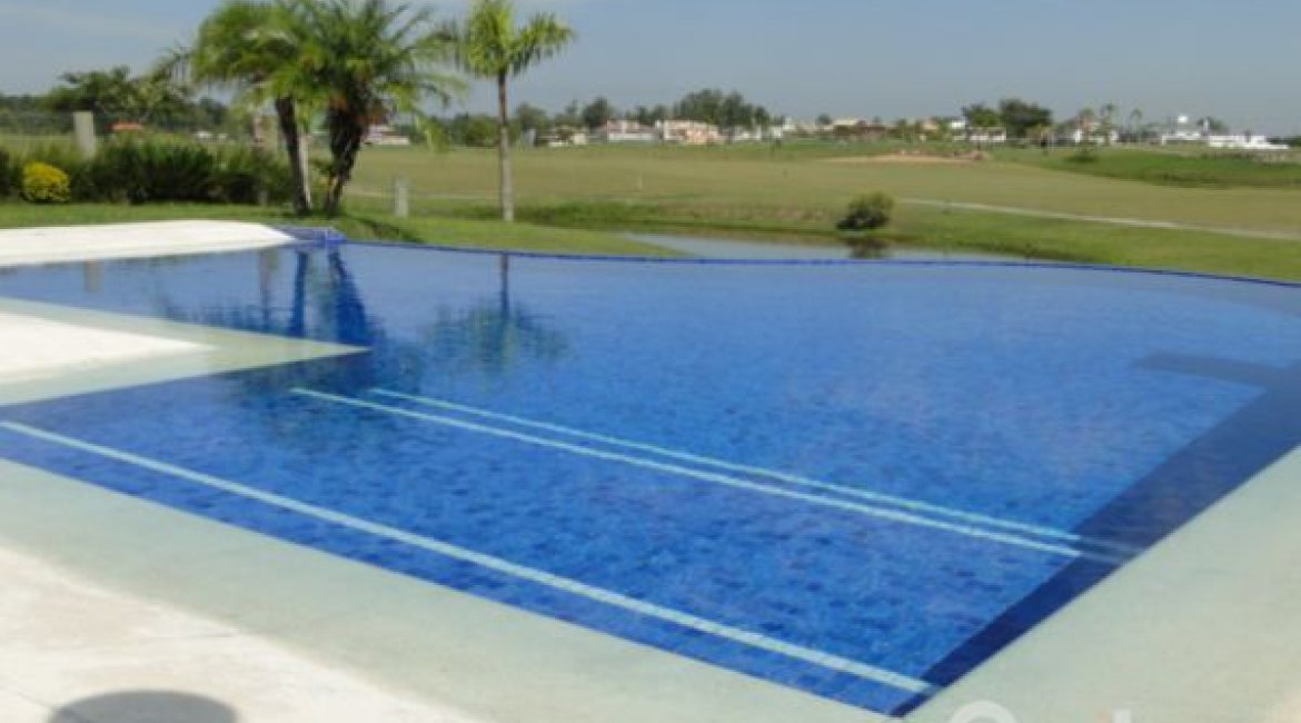 Casa em Condomínio à venda com 472m², 4 dormitórios, 3 suítes, 2 vagas, no bairro Terra Ville em PORTO ALEGRE