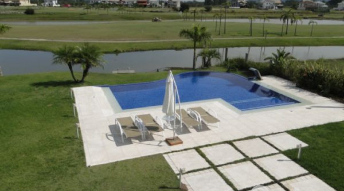 Casa em Condomínio à venda com 472m², 4 dormitórios, 3 suítes, 2 vagas, no bairro Terra Ville em PORTO ALEGRE