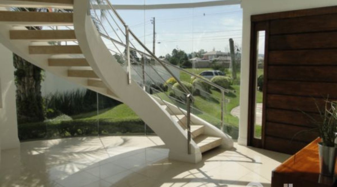 Casa em Condomínio à venda com 472m², 4 dormitórios, 3 suítes, 2 vagas, no bairro Terra Ville em PORTO ALEGRE