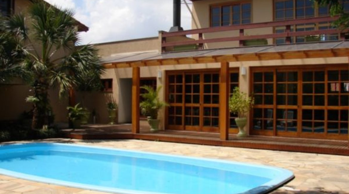 Casa em Condomínio à venda com 278m², 3 dormitórios, 1 suíte, 3 vagas, no bairro Tristeza em Porto Alegre