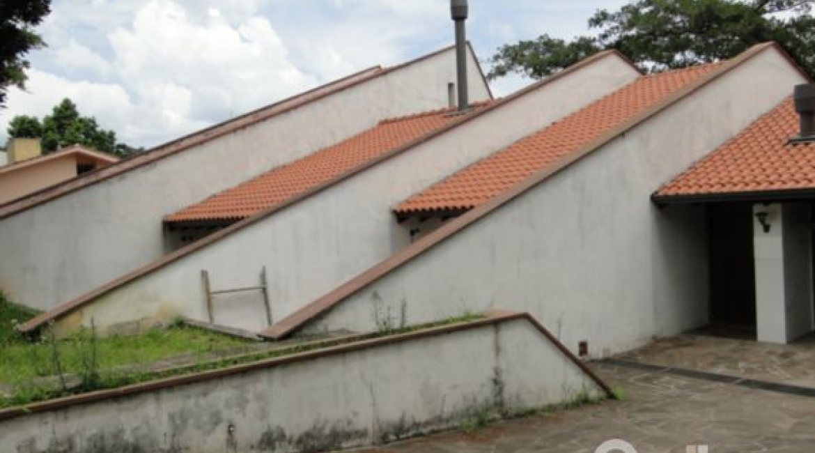 Casa à venda com 530m², 7 dormitórios, 5 suítes, 2 vagas, no bairro Jardim Isabel em Porto Alegre