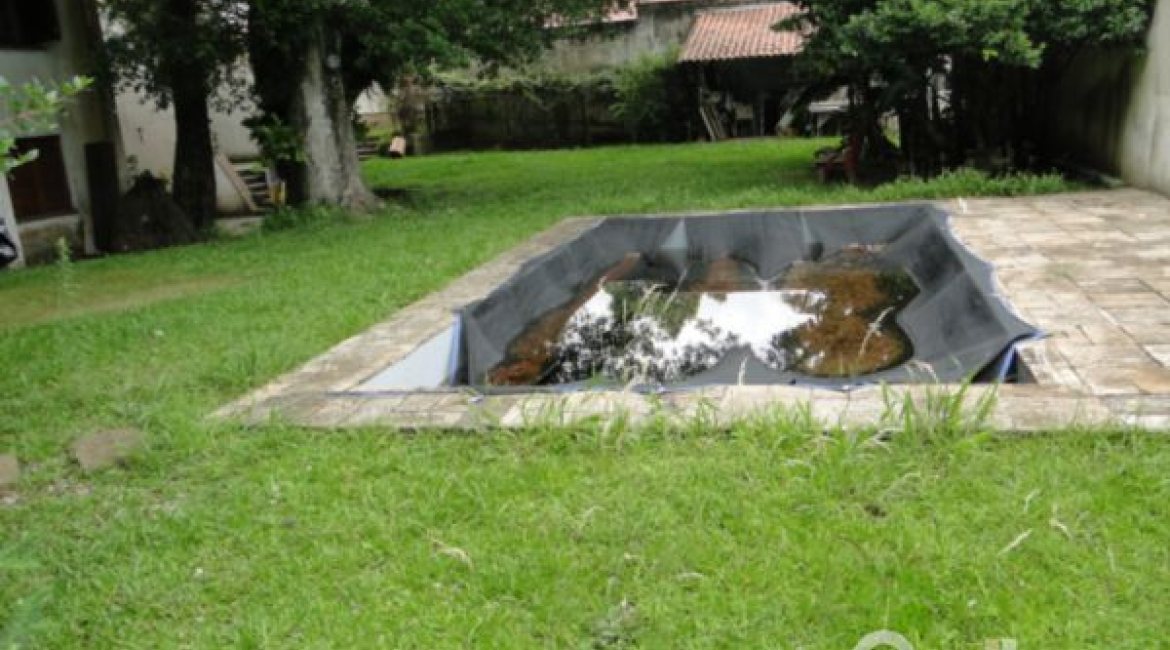 Casa à venda com 530m², 7 dormitórios, 5 suítes, 2 vagas, no bairro Jardim Isabel em Porto Alegre