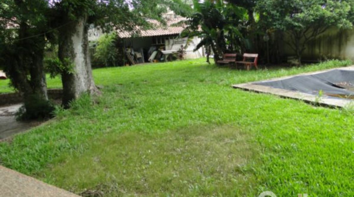 Casa à venda com 530m², 7 dormitórios, 5 suítes, 2 vagas, no bairro Jardim Isabel em Porto Alegre