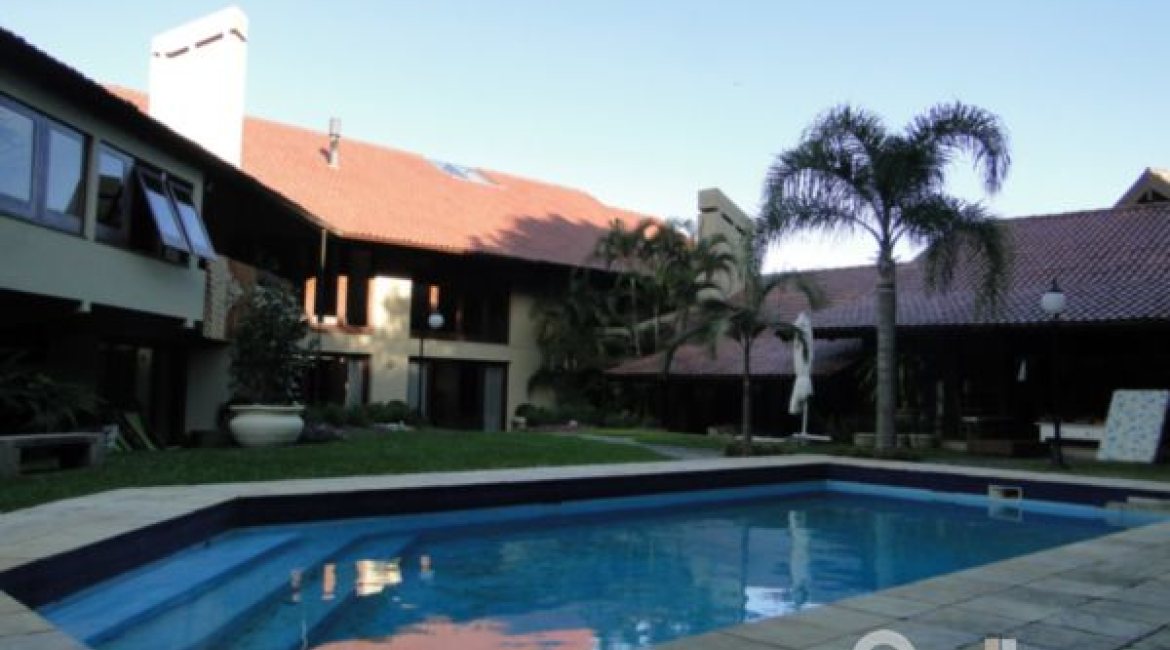 Casa em Condomínio à venda com 1350m², 7 dormitórios, 5 suítes, 4 vagas, no bairro Cavalhada em PORTO ALEGRE