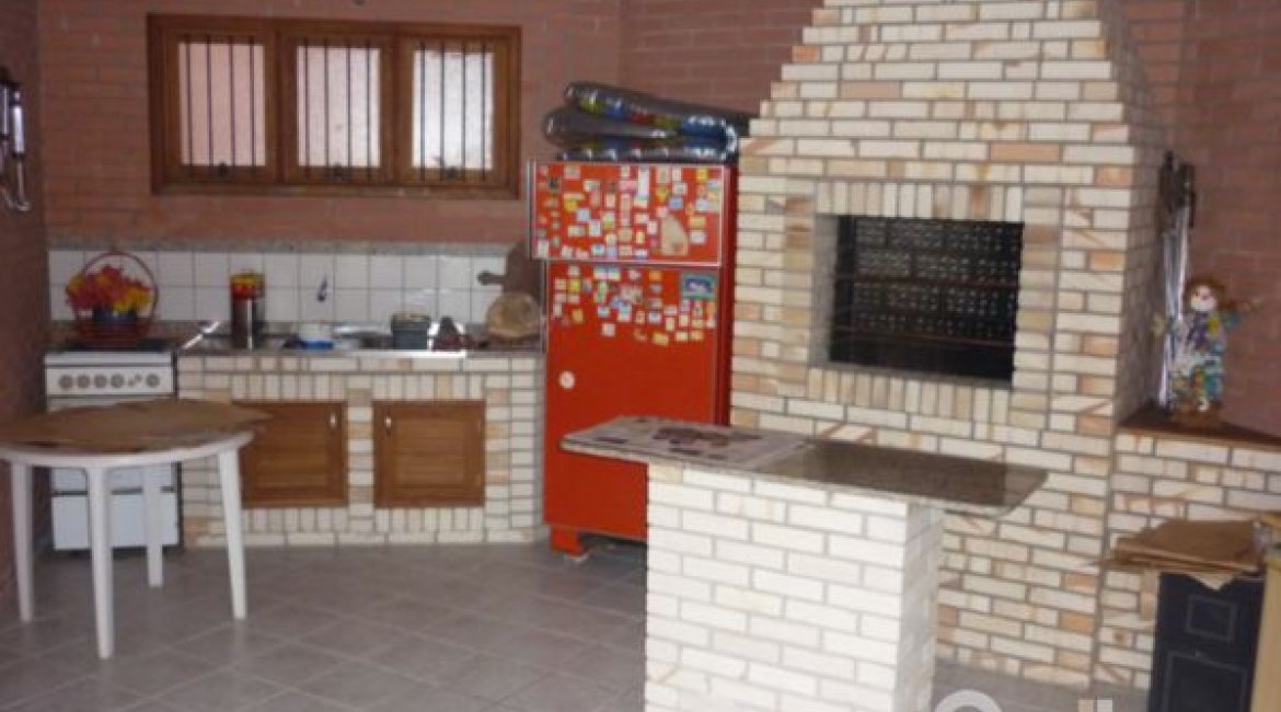 Casa à venda com 580m², 4 dormitórios, 4 suítes, 2 vagas, no bairro Jardim Isabel em Porto Alegre