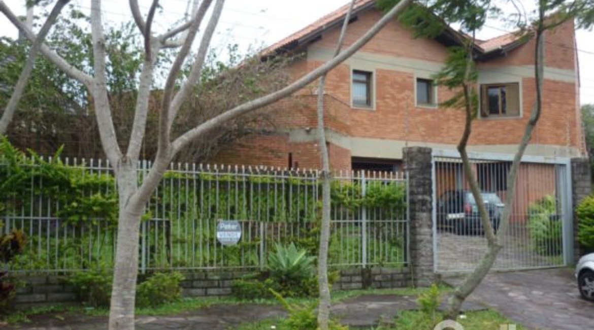 Casa à venda com 580m², 4 dormitórios, 4 suítes, 2 vagas, no bairro Jardim Isabel em Porto Alegre