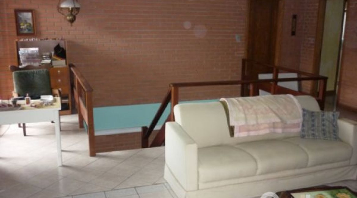 Casa à venda com 580m², 4 dormitórios, 4 suítes, 2 vagas, no bairro Jardim Isabel em Porto Alegre