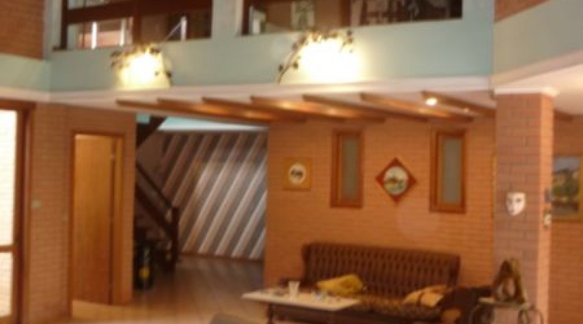 Casa à venda com 580m², 4 dormitórios, 4 suítes, 2 vagas, no bairro Jardim Isabel em Porto Alegre