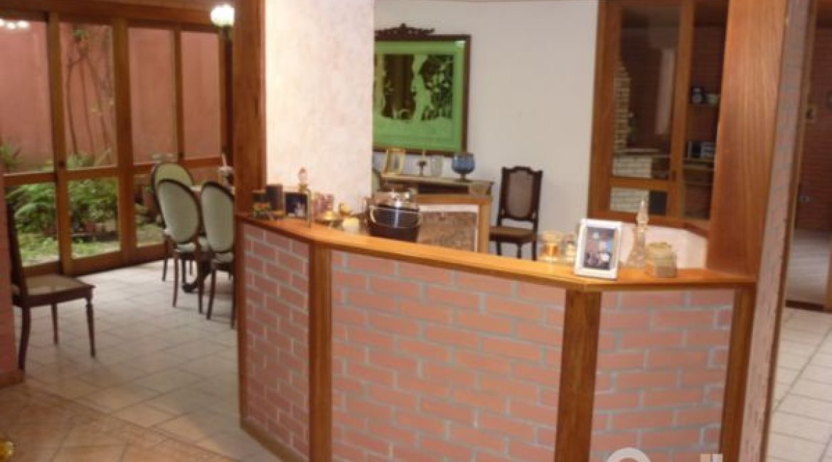 Casa à venda com 580m², 4 dormitórios, 4 suítes, 2 vagas, no bairro Jardim Isabel em Porto Alegre