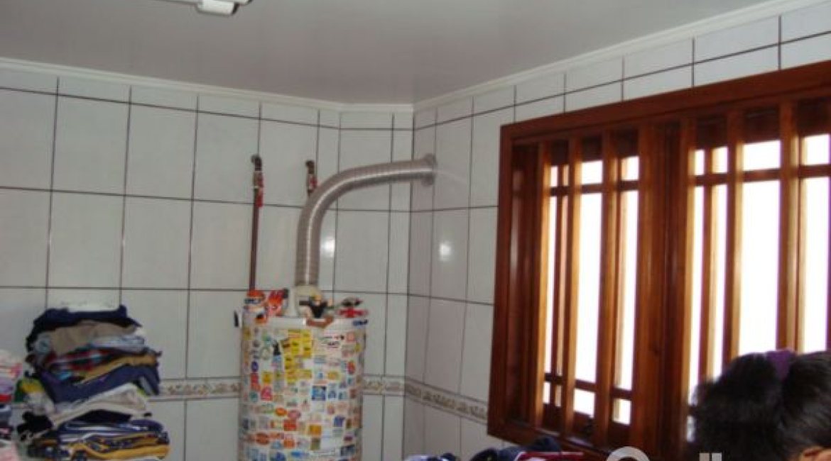 Casa à venda com 520m², 4 dormitórios, 1 suíte, 3 vagas, no bairro Tristeza em Porto Alegre