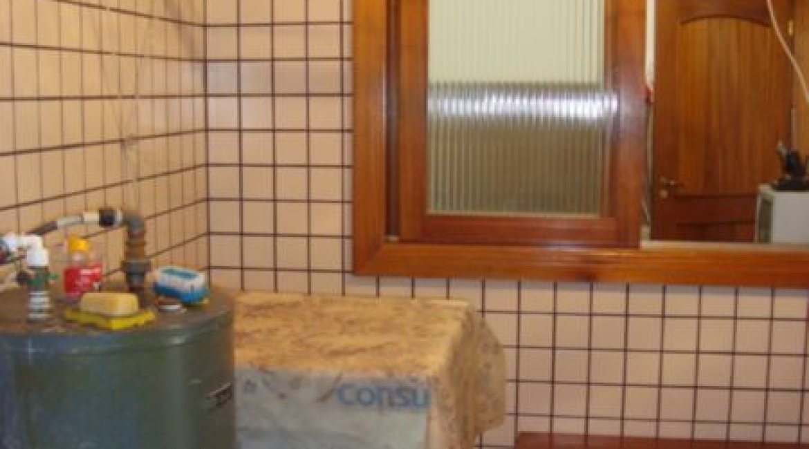 Casa à venda com 280m², 3 dormitórios, 1 suíte, 2 vagas, no bairro Tristeza em Porto Alegre