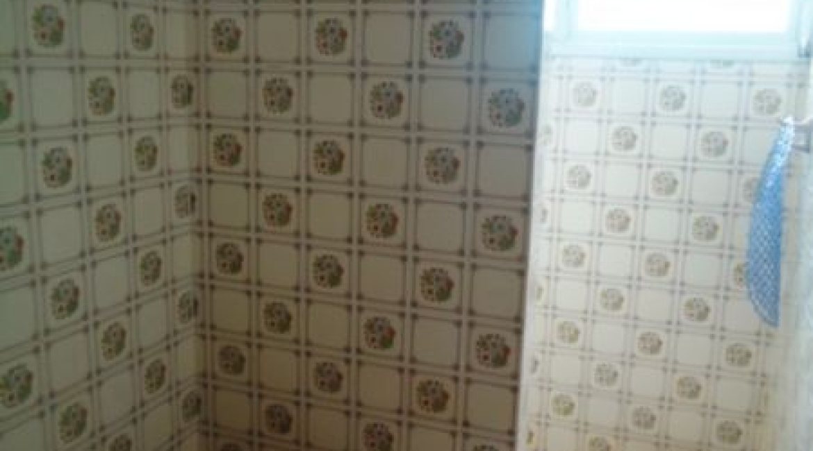 Casa à venda com 181m², 3 dormitórios, 1 suíte, 4 vagas, no bairro Ipanema em Porto Alegre