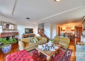 Casa em Condomínio à venda com 245m², 3 dormitórios, 1 suíte, 3 vagas, no bairro Vila Assunção em Porto Alegre
