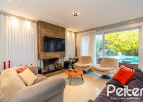 Casa em Condomínio à venda com 220m², 4 dormitórios, 4 suítes, 2 vagas, no bairro Terra Ville em PORTO ALEGRE