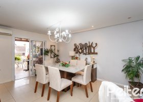 Casa em Condomínio à venda com 132m², 3 dormitórios, 1 suíte, 2 vagas, no bairro Vila Nova em PORTO ALEGRE