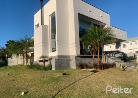 Casa em Condomínio à venda com 255m², 3 dormitórios, 3 suítes, 4 vagas, no bairro Alphaville em PORTO ALEGRE