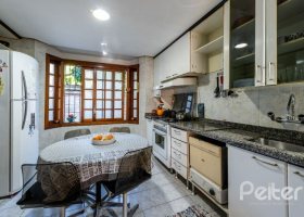 Casa em Condomínio à venda com 198m², 4 dormitórios, 1 suíte, 2 vagas, no bairro Jardim Isabel em Porto Alegre