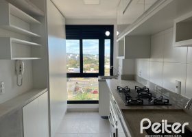 Apartamento à venda com 100m², 3 dormitórios, 1 suíte, 2 vagas, no bairro Cristal em Porto Alegre