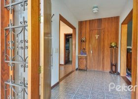 Casa em Condomínio à venda com 200m², 3 dormitórios, 1 suíte, 3 vagas, no bairro Pedra Redonda em PORTO ALEGRE