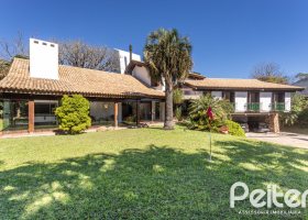 Casa em Condomínio à venda com 600m², 4 dormitórios, 4 suítes, 6 vagas, no bairro Cavalhada em PORTO ALEGRE