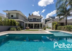 Casa em Condomínio à venda com 233m², 3 dormitórios, 3 suítes, 4 vagas, no bairro Terra Ville em PORTO ALEGRE