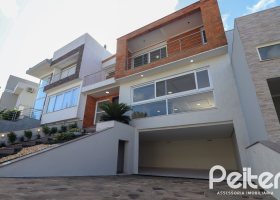 Casa em Condomínio à venda com 249m², 3 dormitórios, 3 suítes, 4 vagas, no bairro Hipica em PORTO ALEGRE