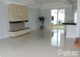 Casa em Condomínio à venda com 164m², 3 dormitórios, 1 suíte, 2 vagas, no bairro Hípica em PORTO ALEGRE