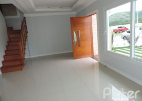 Casa em Condomínio à venda com 164m², 3 dormitórios, 1 suíte, 2 vagas, no bairro Hípica em PORTO ALEGRE