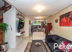 Casa em Condomínio à venda com 184m², 3 dormitórios, 1 suíte, 2 vagas, no bairro Vila Assunção em Porto Alegre