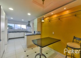 Casa em Condomínio à venda com 488m², 4 dormitórios, 2 suítes, 2 vagas, no bairro Cavalhada em PORTO ALEGRE