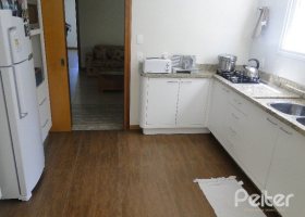 Casa em Condomínio à venda com 288m², 4 dormitórios, 2 suítes, 2 vagas, no bairro Knorr em Porto Alegre