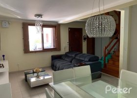 Casa em Condomínio à venda com 122m², 3 dormitórios, 1 suíte, 2 vagas, no bairro Cristal em Porto Alegre