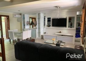 Casa em Condomínio à venda com 122m², 3 dormitórios, 1 suíte, 2 vagas, no bairro Cristal em Porto Alegre