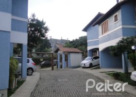 Casa em Condomínio à venda com 122m², 3 dormitórios, 1 suíte, 2 vagas, no bairro Cristal em Porto Alegre