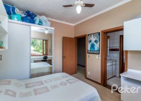 Casa em Condomínio à venda com 600m², 5 dormitórios, 5 suítes, 4 vagas, no bairro Cavalhada em Porto Alegre