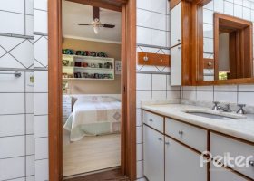 Casa em Condomínio à venda com 600m², 5 dormitórios, 5 suítes, 4 vagas, no bairro Cavalhada em Porto Alegre
