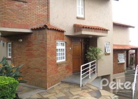 Casa em Condomínio à venda com 198m², 3 dormitórios, 1 suíte, 2 vagas, no bairro Tristeza em Porto Alegre
