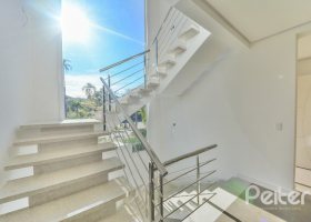 Casa em Condomínio à venda com 543m², 4 dormitórios, 4 suítes, 6 vagas, no bairro Pedra Redonda em PORTO ALEGRE